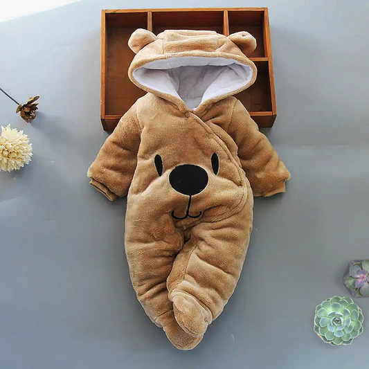 a baby sleeping bag with a bear on it
